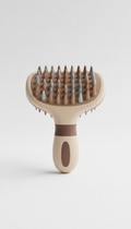 Silicone grooming brush with ergonomic grip